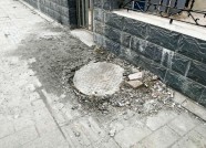 追踪：居委会“买单” 潍坊安顺路人行道上的化粪池修好了