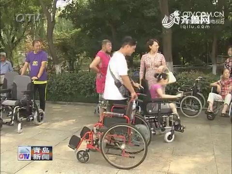 简讯：青岛市北区为残疾人发放电动轮椅