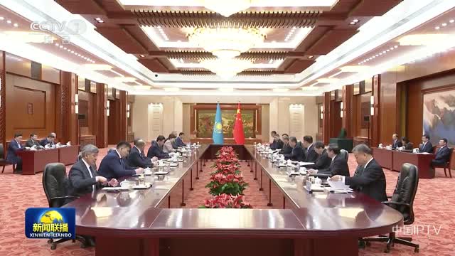 赵乐际同哈萨克斯坦议会下院议长举行会谈