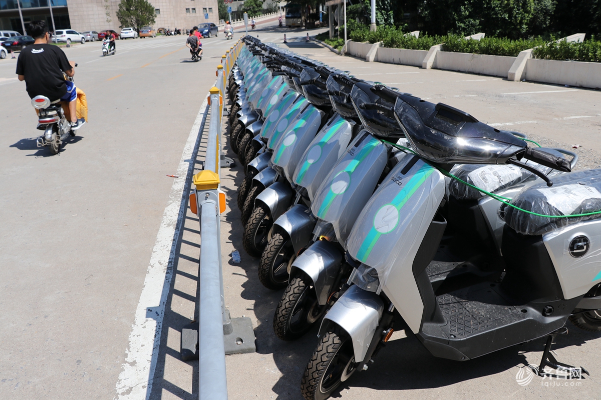 济南一高校现共享电动车骑行费用拟定15分钟1元钱