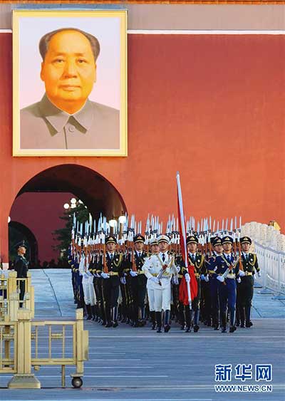 10月1日清晨，隆重的升国旗仪式在北京天安门广场举行，庆祝中华人民共和国成立69周年。.jpg