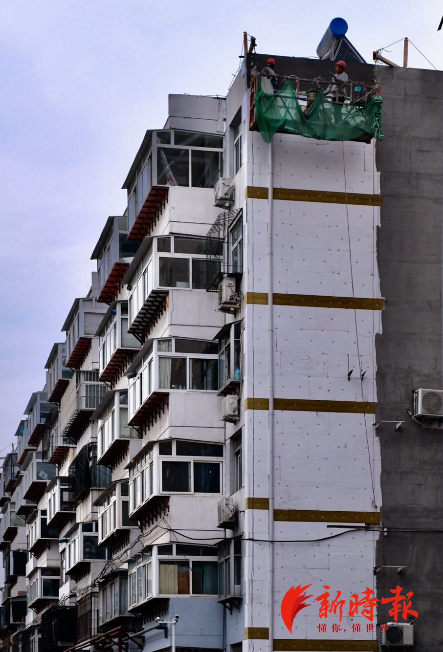 济南老旧楼外墙穿棉衣冬季室温最少升2