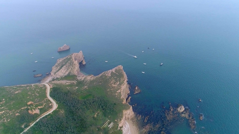 全国百名垂钓精英齐聚威海南海新区挥杆论英雄
